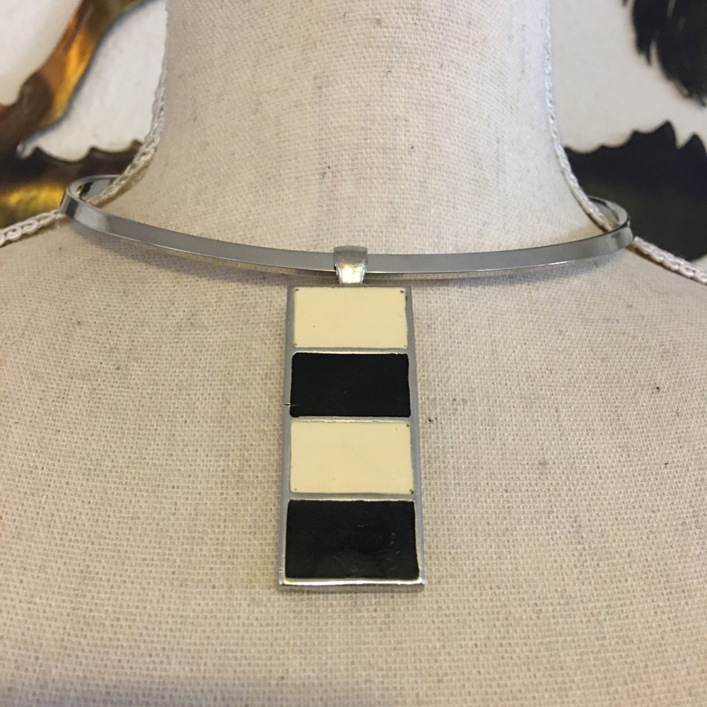 Black and cream enamel pendant on silver choker